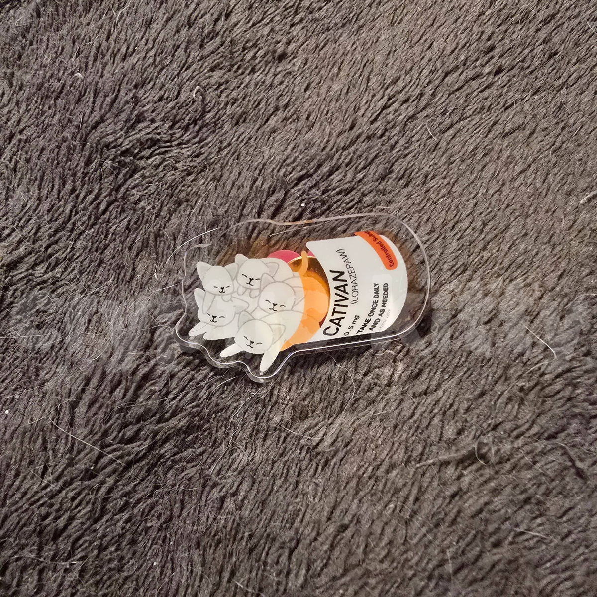 cativan acrylic pin